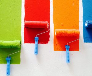 Rollers painting on wall